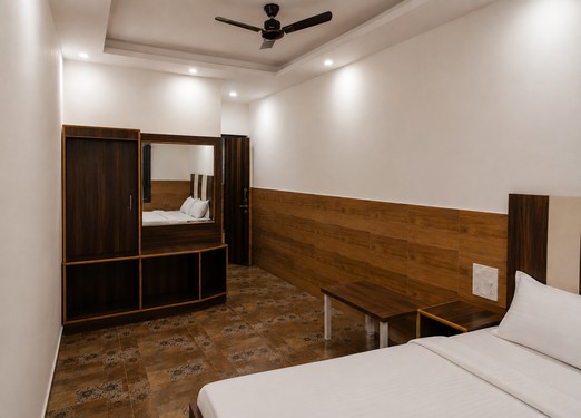 <p>A simple and comfortable room with a double bed, ideal for guests looking for an affordable stay with essential facilities.</p>