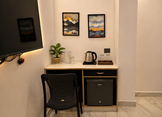 <p>Offering extra space and four comfortable beds, this deluxe room is well suited for families and groups visiting Puri.</p>