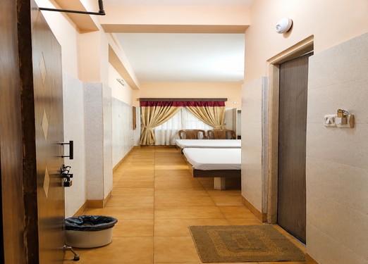 <p>Spacious air-conditioned room with four beds, offering a comfortable stay for families or groups travelling together.</p>